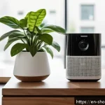 Home 21 IoT 기기 설치 방법 및 주의사항 - A modern, cozy living room setting featuring a smart security camera mounted on a wall near a window...
